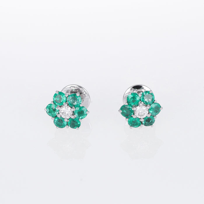 Orecchini a Lobo in Oro Bianco 18kt con Petali di Smeraldo e Diamante Centrale