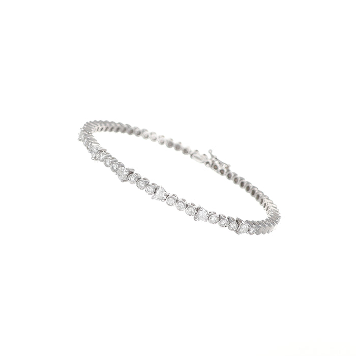Bracciale rigido in oro bianco con cuori e diamanti