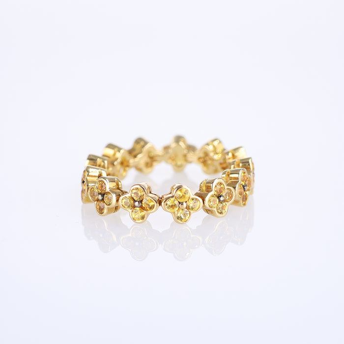 Anello Eternity con Motivo Floreale in Oro Giallo 18k e Zaffiri Gialli