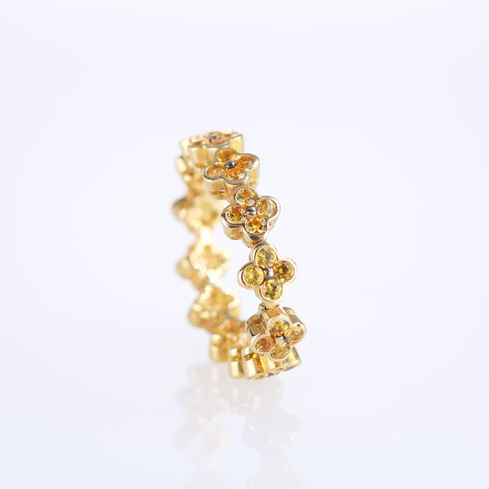 Anello Eternity con Motivo Floreale in Oro Giallo 18k e Zaffiri Gialli