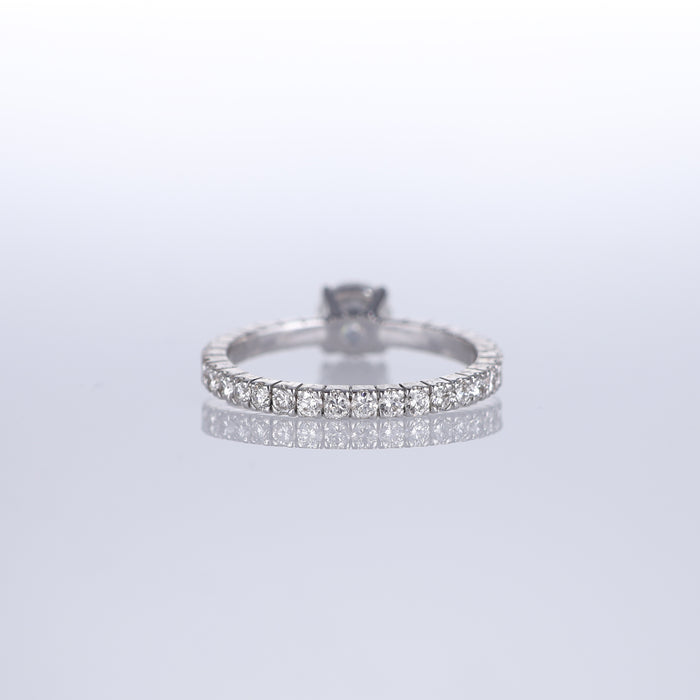 Anello Solitario in Oro Bianco 18kt con Diamante Centrale da 0,70 ct e Fascia con Diamanti