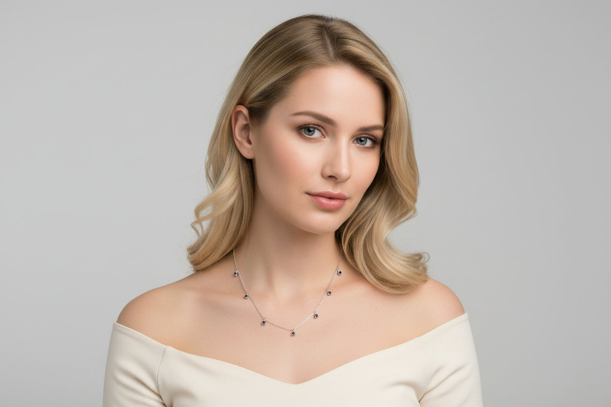 Collana in Oro Bianco 18kt con Pendente in Zaffiri Blu