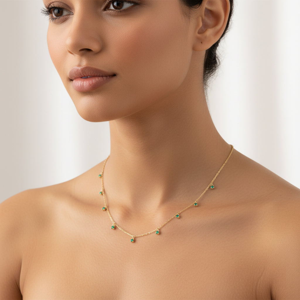 Collana in Oro Bianco 18kt con Sette Pendenti di Smeraldi