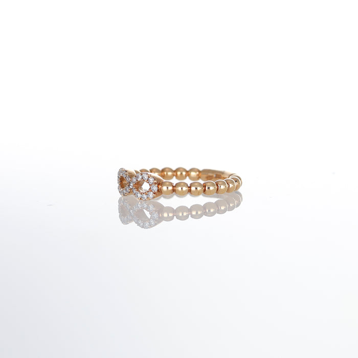 Anello in Oro Rosa con Sferine e Simbolo Infinito in Diamanti