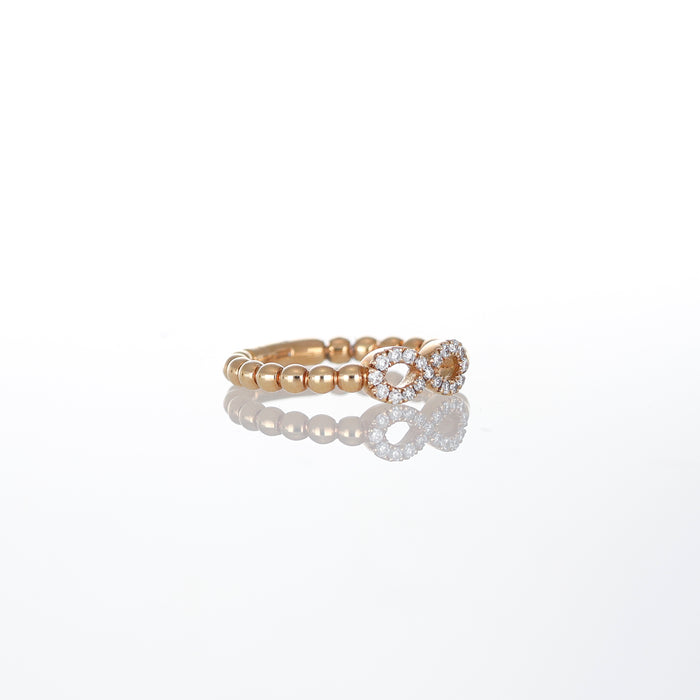 Anello in Oro Rosa con Sferine e Simbolo Infinito in Diamanti