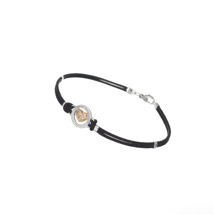 Bracciale con cuore in oro giallo e diamanti su cordino nero