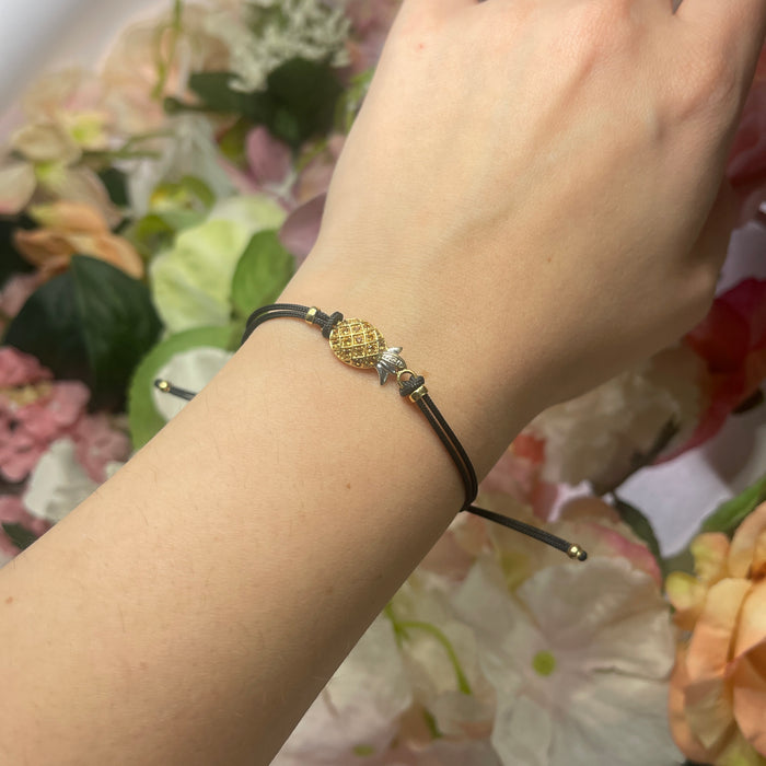 Bracciale con ananas in zaffiri gialli su cordino regolabile