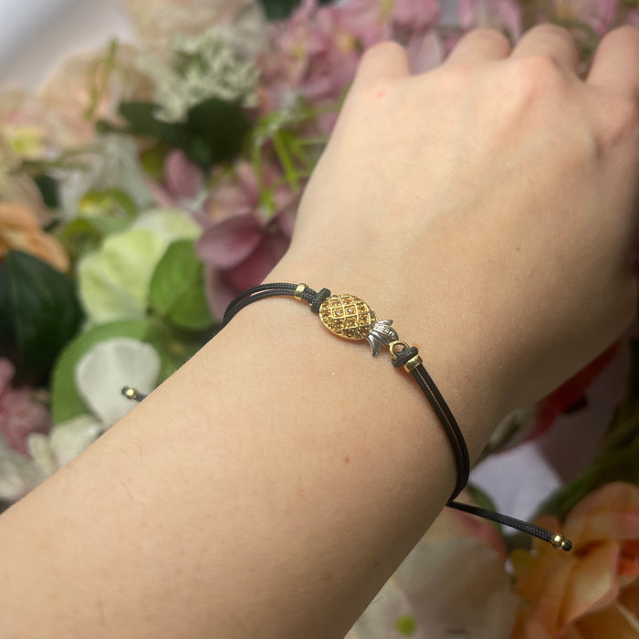 Bracciale con ananas in zaffiri gialli su cordino regolabile