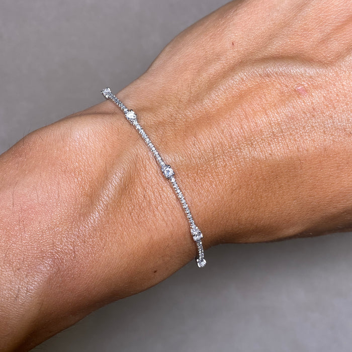 Bracciale Tennis in oro bianco con spot di diamanti naturali