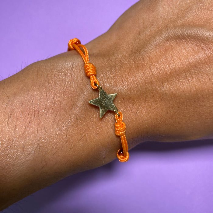 Bracciale in oro giallo con stella