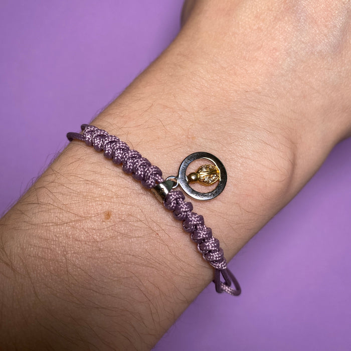 Bracciale con coccinella in oro e diamanti su cordino lilla