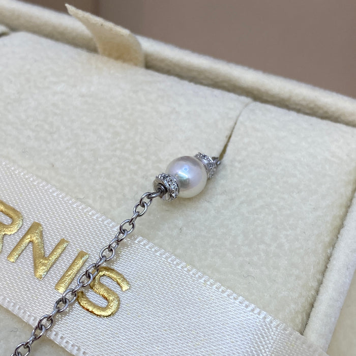 Chanel con diamanti e perle